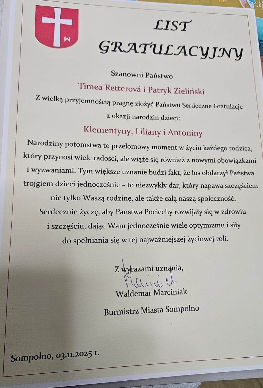 8) Na zdjęciu list gratulacyjny od burmistrza.